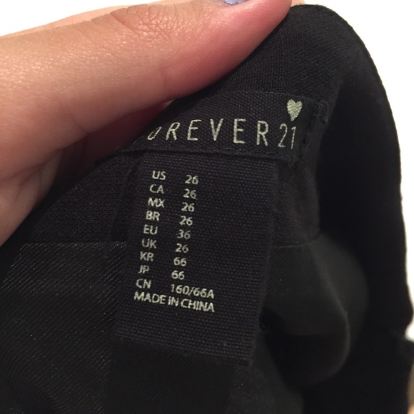 BLACK PLEATED SKIRT - Picture 4 of 4